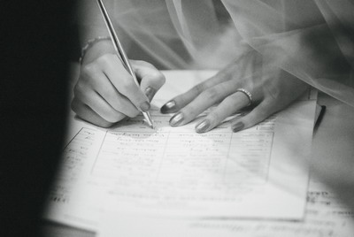 Signing of the Register (the bride)
